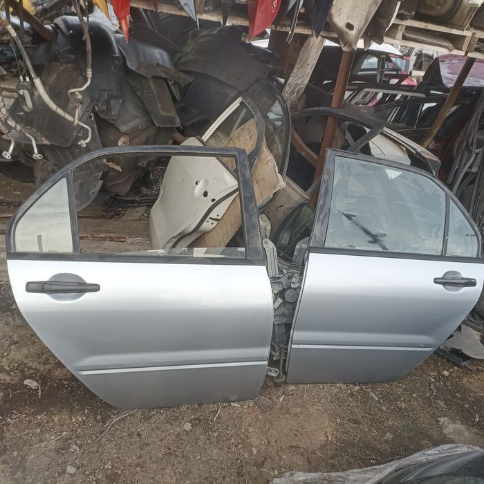 Двері R  L useМітсубісі ланцер 9