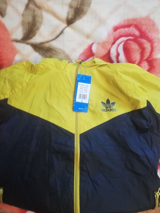 Олімпійки Adidas Originals і куртки весна-осінь The North Face