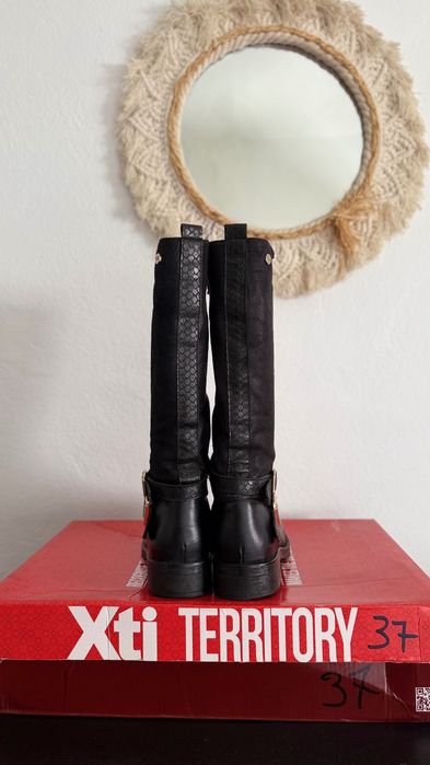Botas cano alto