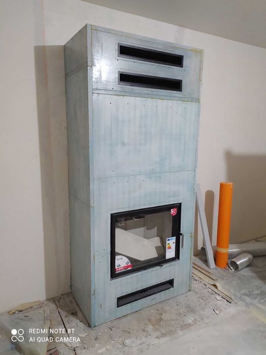 Якісний монтаж каміна з обігрівом на будинок