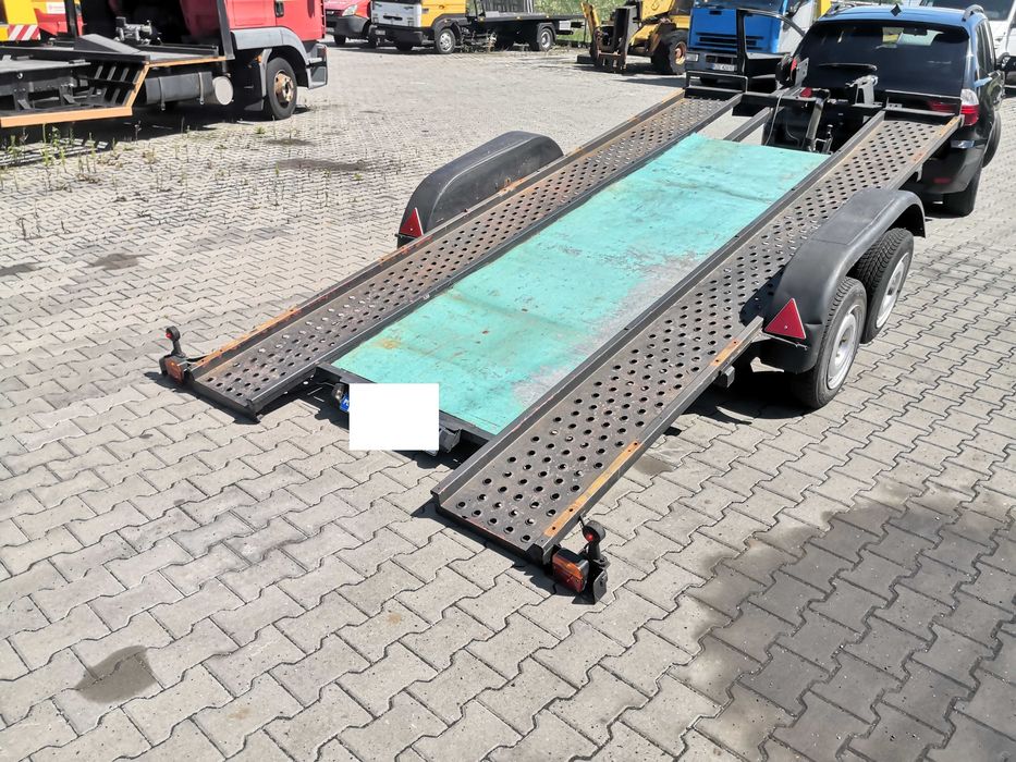 uchylna przyczepa laweta DMC 1550 KG lad 1200 KG