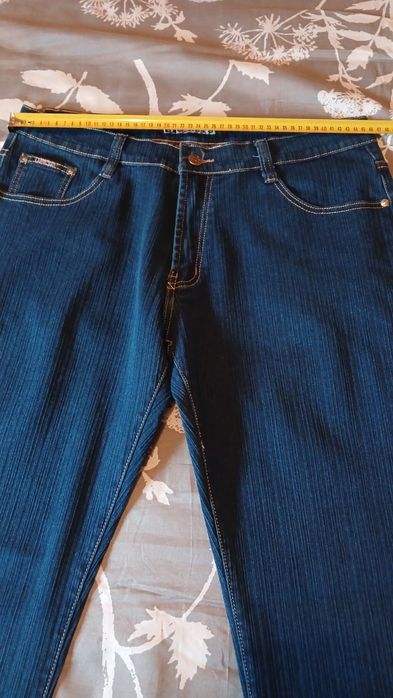 Продам джинсы 52 размера