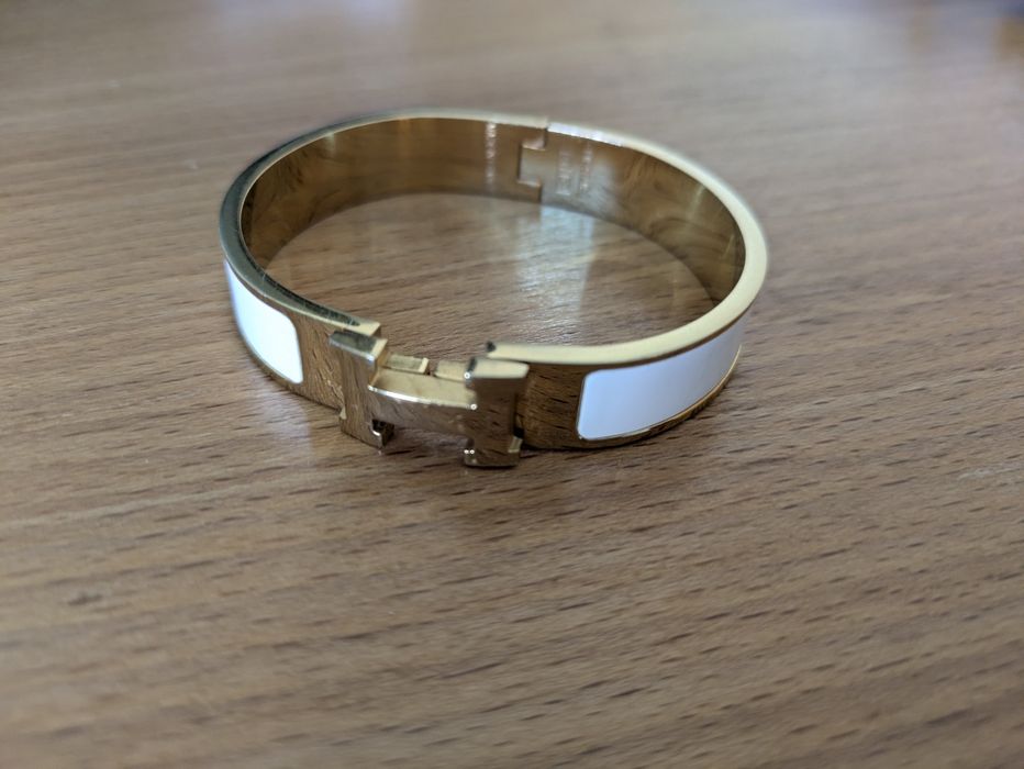 Pulseira Hermès de clic, branco e dourado