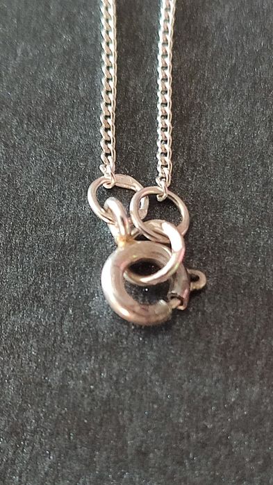 Łańcuszek ze znakiem zodiaku baran.
