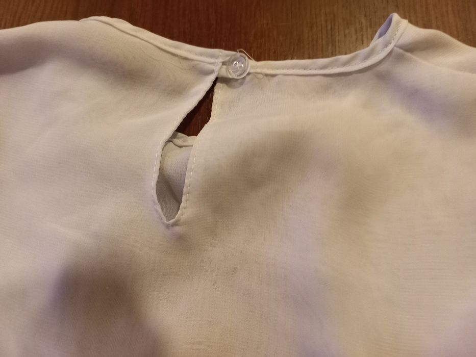 Biała bluzeczka z kokardką 158