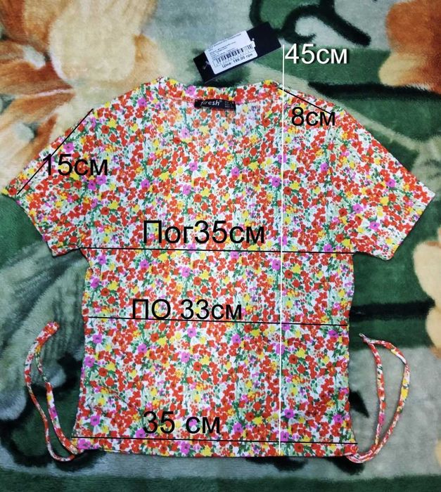 Футболка оранжевая в цветочек на девочку 140-146см