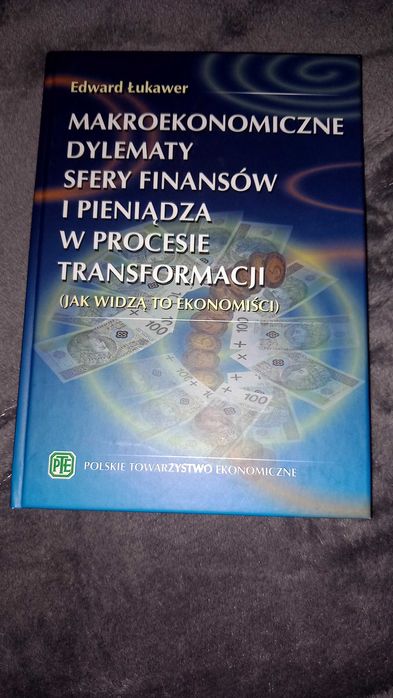 Makroekonomiczne dylematy sf. fin. i pien. w proc. transf. E.Łukawer