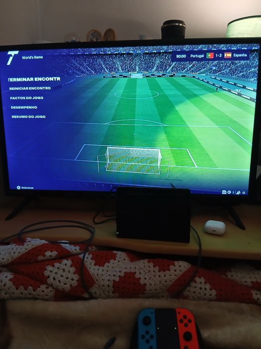 Nintendo switch + FC 26 e respetivos acompanhamentos