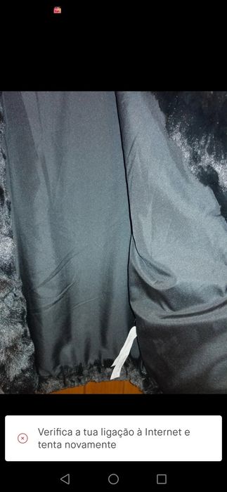 Casaco de pêlo preto