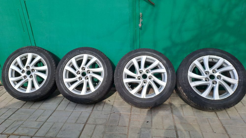 Диски Mazda 3  R16 5x114.3 з шинами