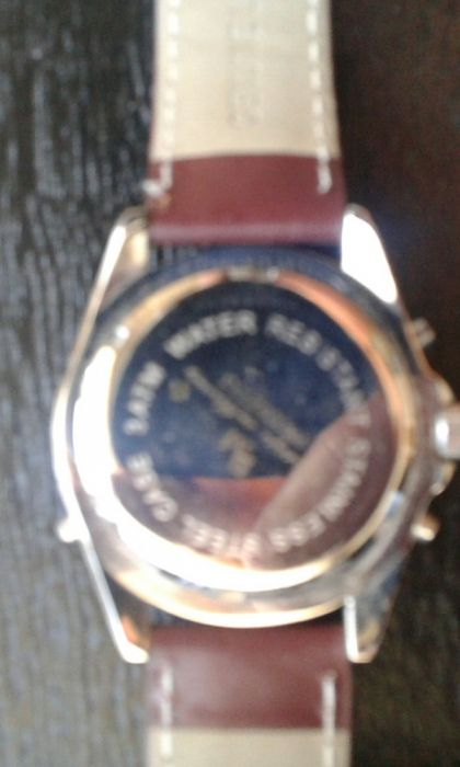 Relógio marca P de M