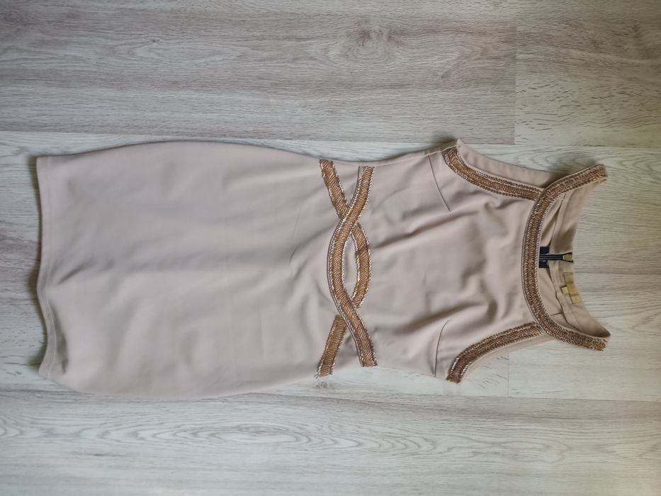 Elegancka sukienka. Rozmiar S