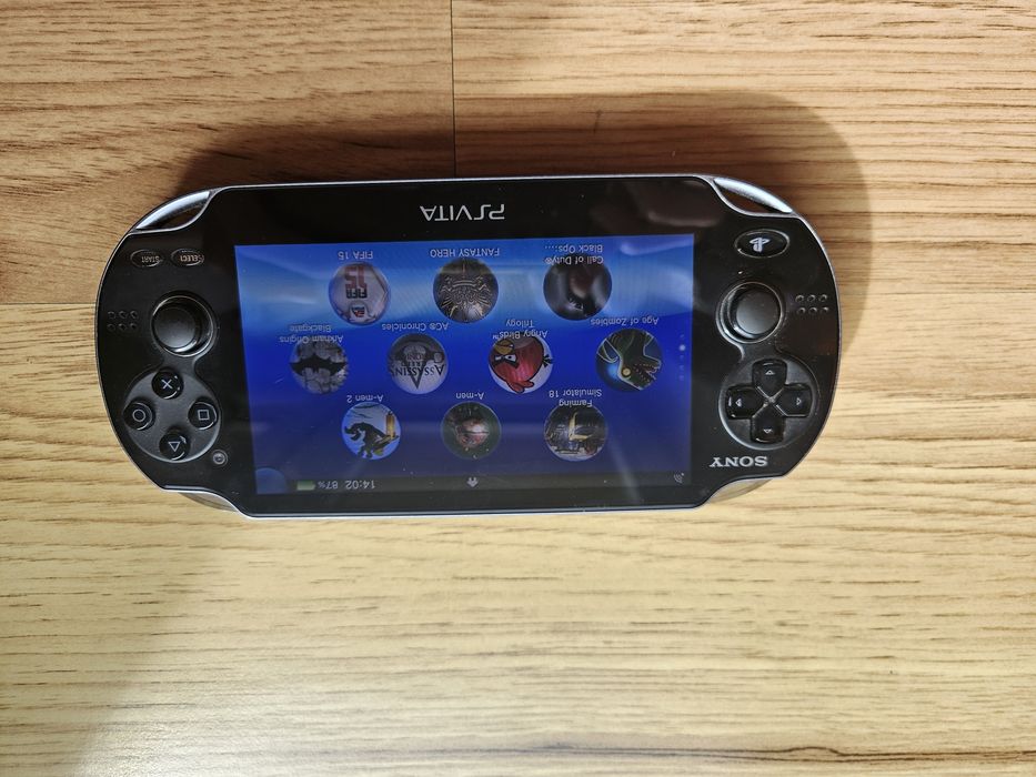 Konsola Sony PS Vita FAT (OLED) Model PCH-1004 | Karta 128GB | Zestaw + Etui + Ładowarka