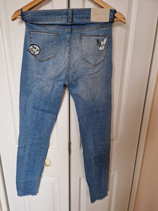 używane spodnie jeansy, dopasowuje się do sylwetki,