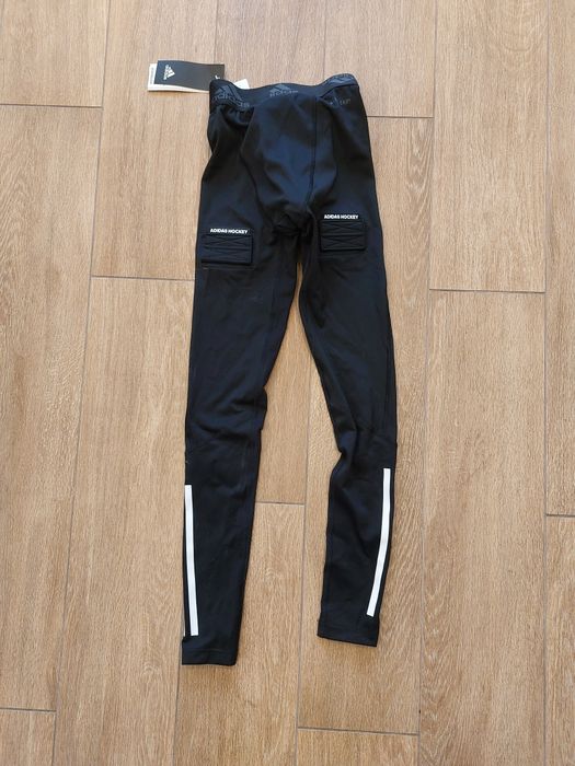 Adidas hokejowe spodnie kompresyjne z suspensorem XS chłopięce GQ9502