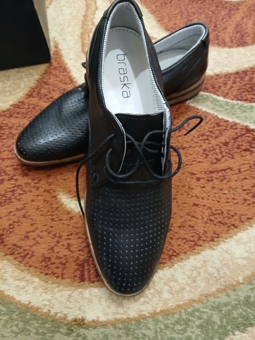 Нові чоловічі туфлі