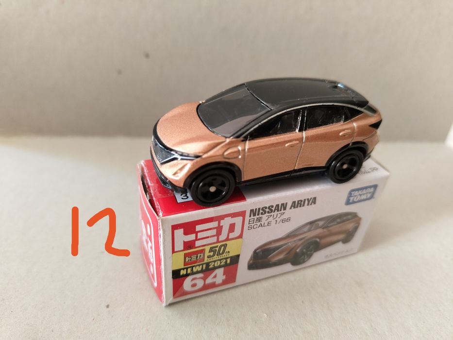 Carros tomica com caixa