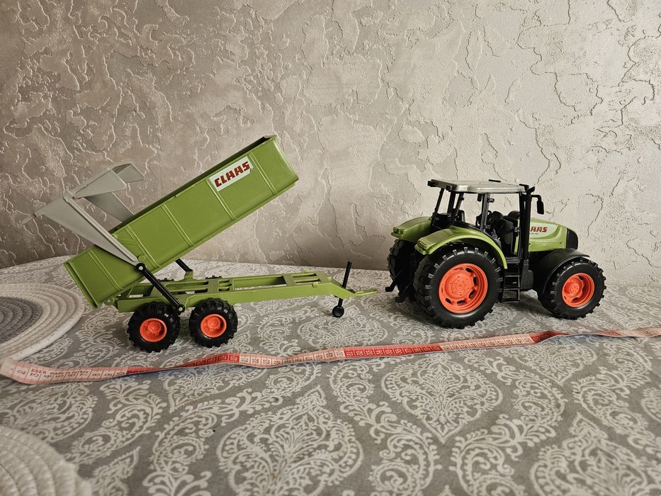 Продам іграшку трактор з причепом