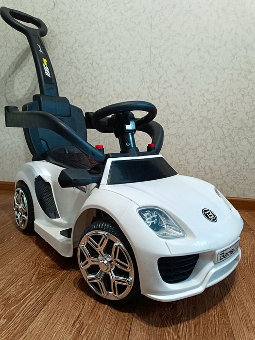 Електромобіль толокатор дитячий