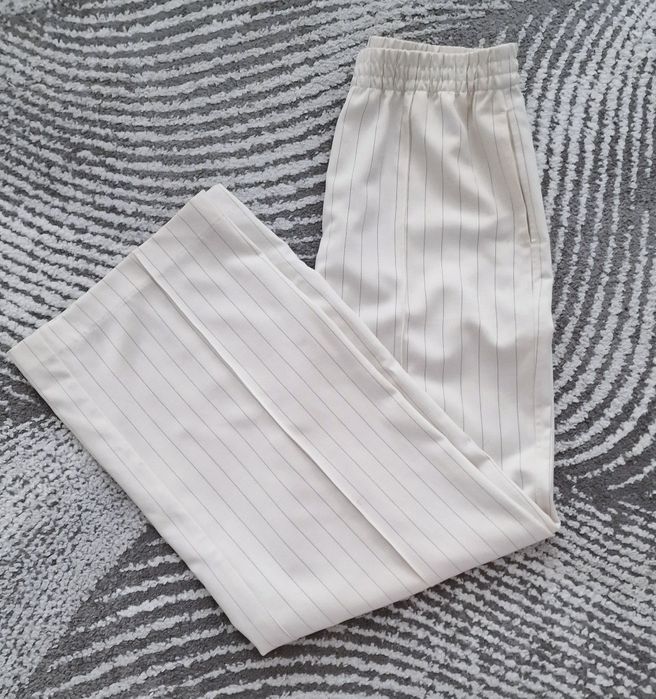 Spodnie szerokie,ecru,paski"H&M".