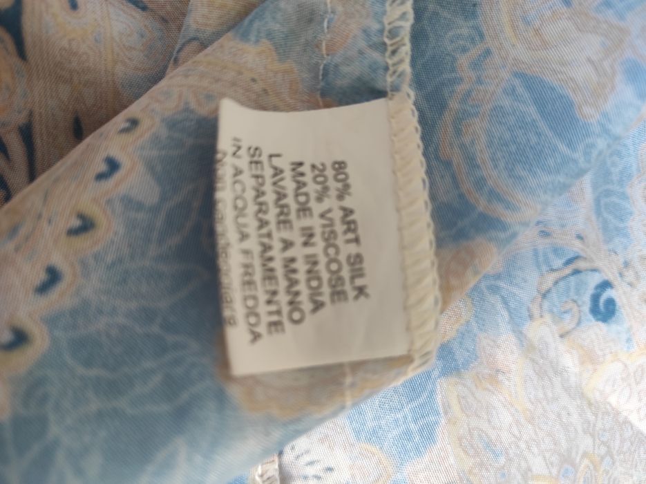 Śliczna sukienka pastelowo niebieska w stylu boho .