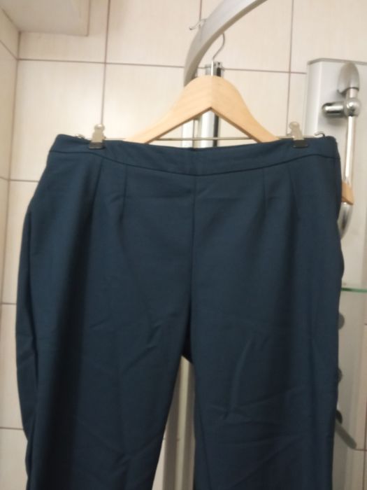 Spodnie damskie granatowe eleganckie M. Suwaki na dole nogawek