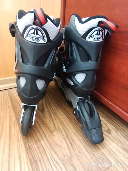 Ролики підліткові, чоловічі Rollerblade (р. 41\26,5 см) стан нових.
