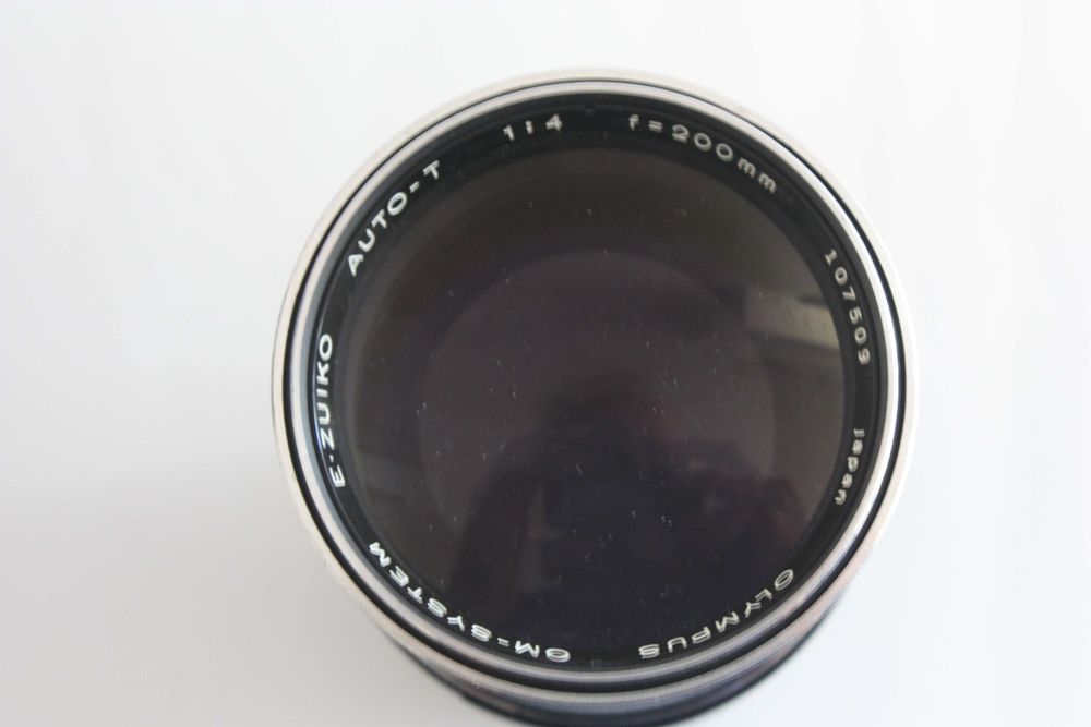 Objectiva Olympus OM, 200 mm, com estojo.