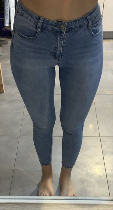 Jeansy laulia z wysokim stanem 38