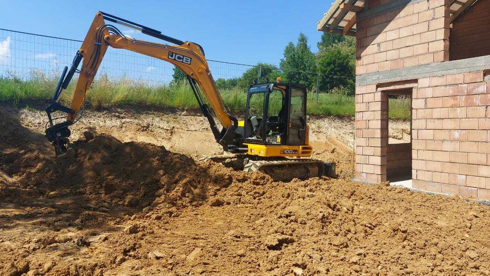 Usługi koparką roboty ziemne wykopy wyburzenia transport Kraków