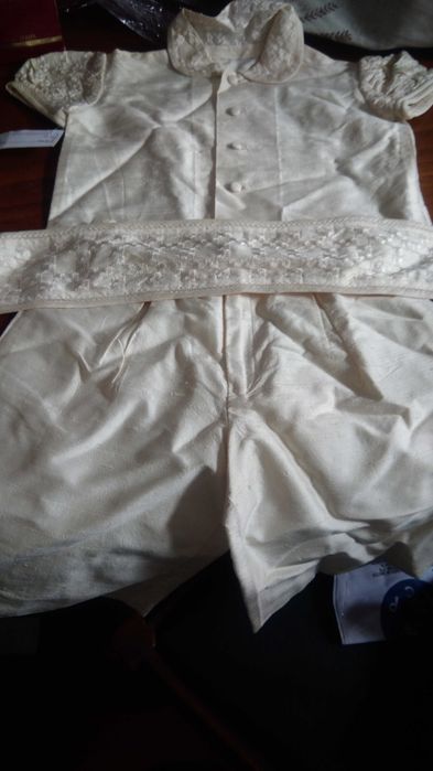 Vestidos e fatinhos de batizado