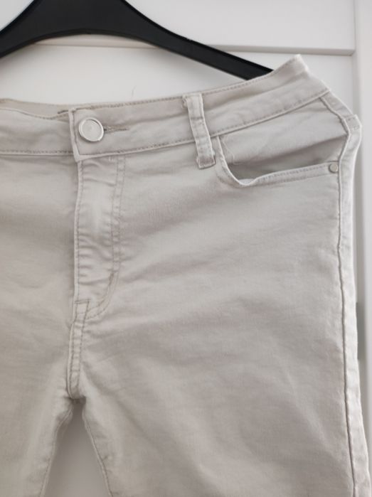 B.S jeans fajne beżowe rozciągliwe rybaczki 42