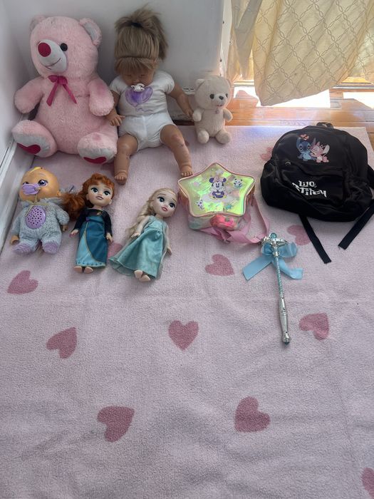 Carpet with few toys and bags