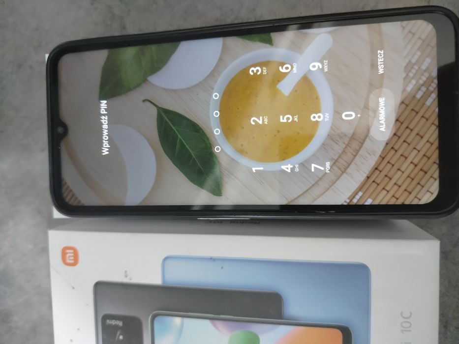 Telefon komórkowy Radmi10c w bardzo dobrym stanie technicznym pudełko