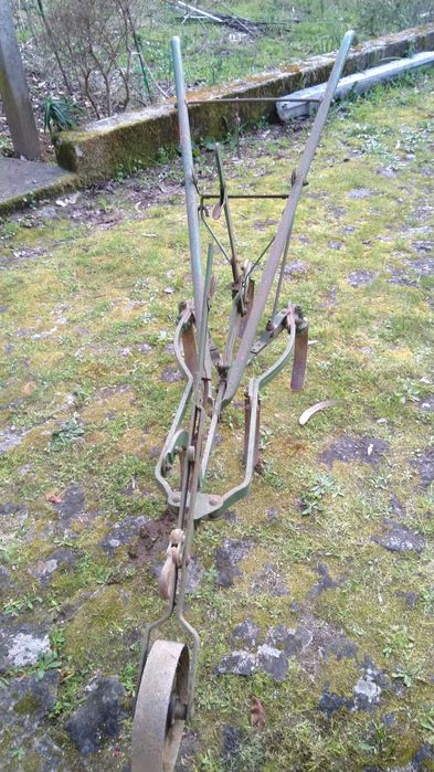 Sachador de milho antigo.