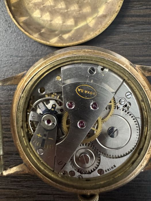 Złoty zegarek Doxa 5277,906  14k 29,15 gr. 585