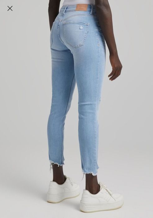 Spodnie jeansowe Bershka przecierane z dziurami r. 38