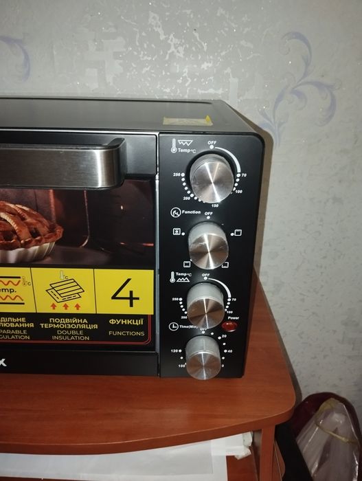 Продам электрическую печь Rotex