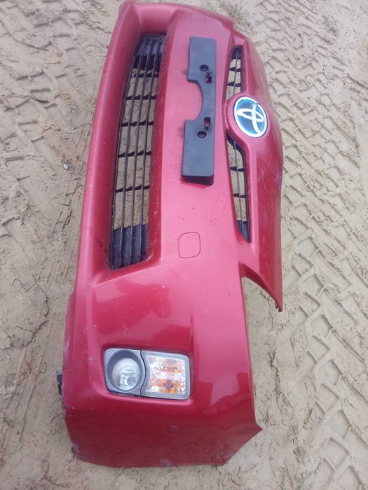 TOYOTA PRIUS III 09-11 zderzak przód kolor czerwony 3r3