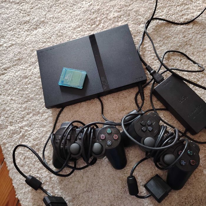 PlayStation 2 com 2 comandos e cartão de memória