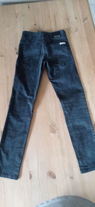 Spodnie czarne jeansy 152