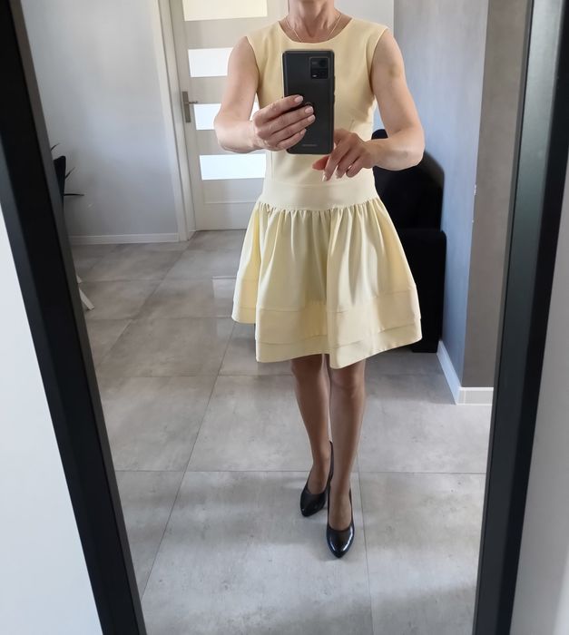 Żółta sukienka koktajlowa 38