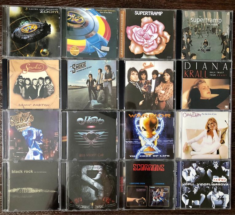 CD диски: Super Tramp. Azia. Paul Mccartney. ВВ. Smokie. Skorpions. Creedence. G. Moore.