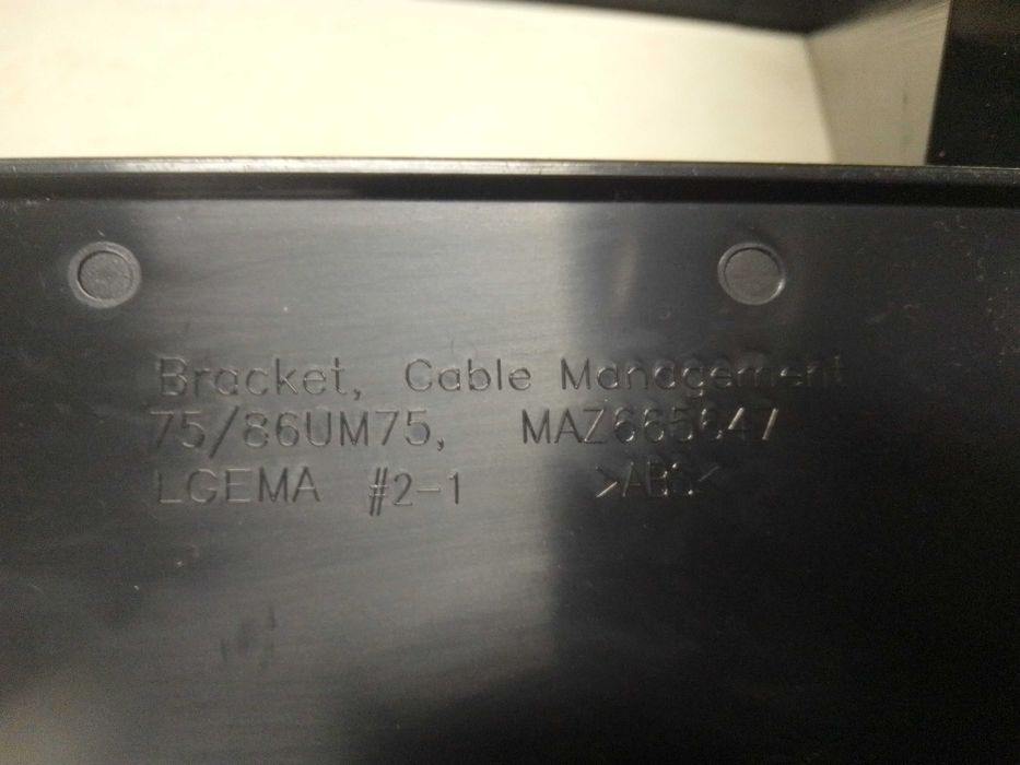 suporte para a gestão de cabos de televisores LG.