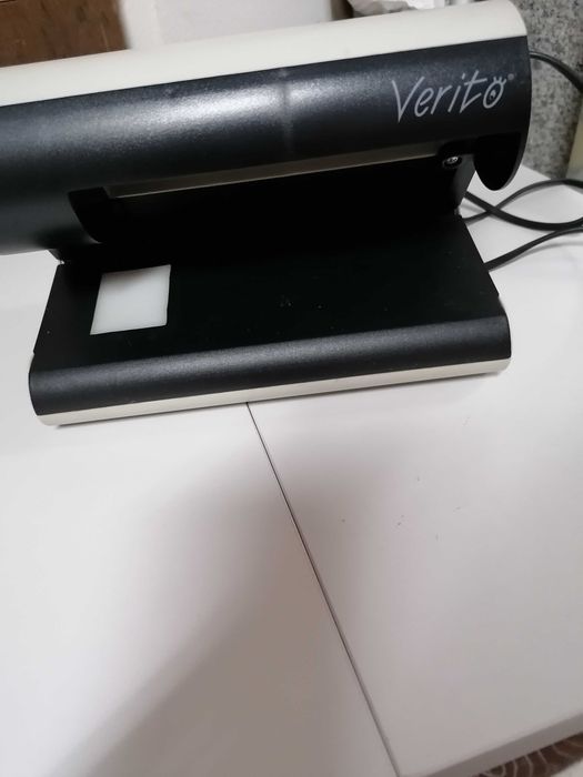 Máquina detetora de notas falsas