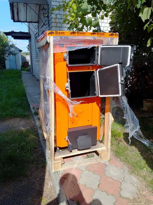 Котел шахтний Холмова,твердотопливный,утилизатор,классический с плитой