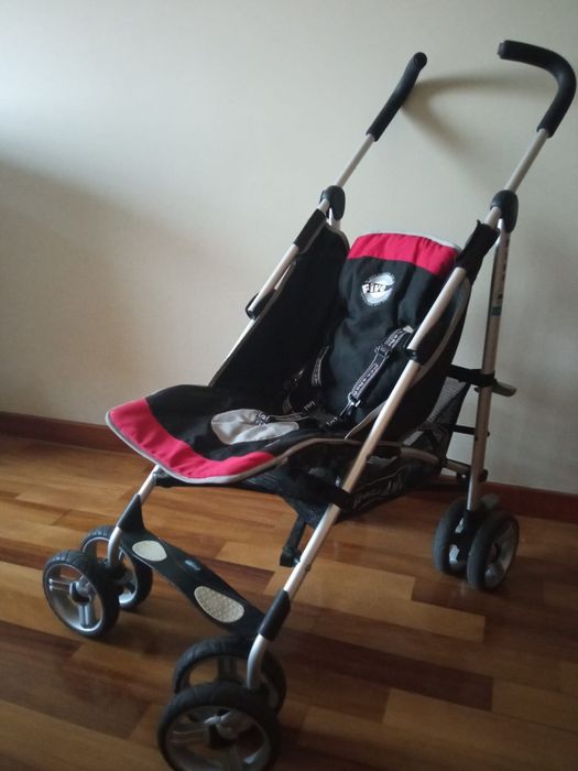 Carrinho de bebé.