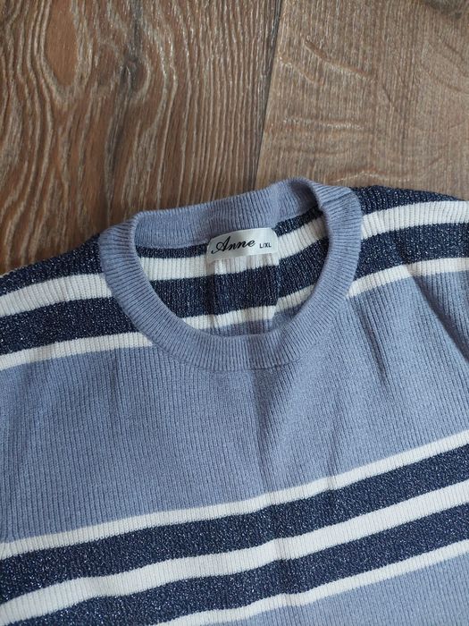 Жіночий гольф в смужку