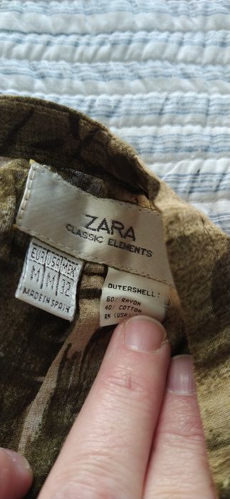 Dezenas de saias midi entre o 40 e 48