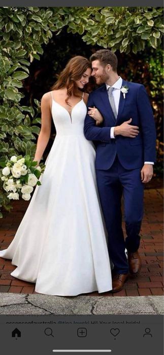 Elegancka Suknia Ślubna z Efektownym Tyłem – Jak Nowa!